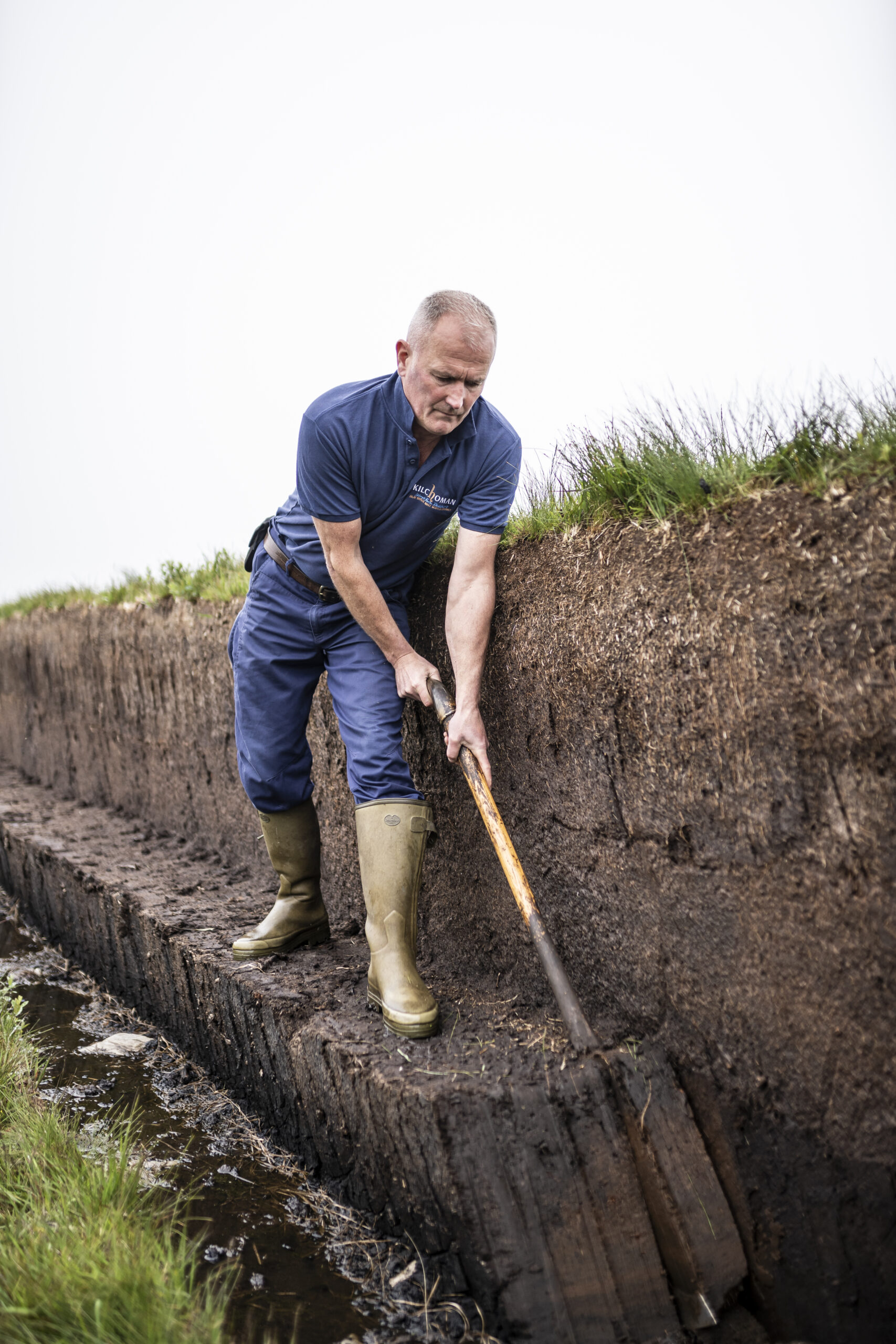 Traditional Peat Cutting Kilchoman Distillery