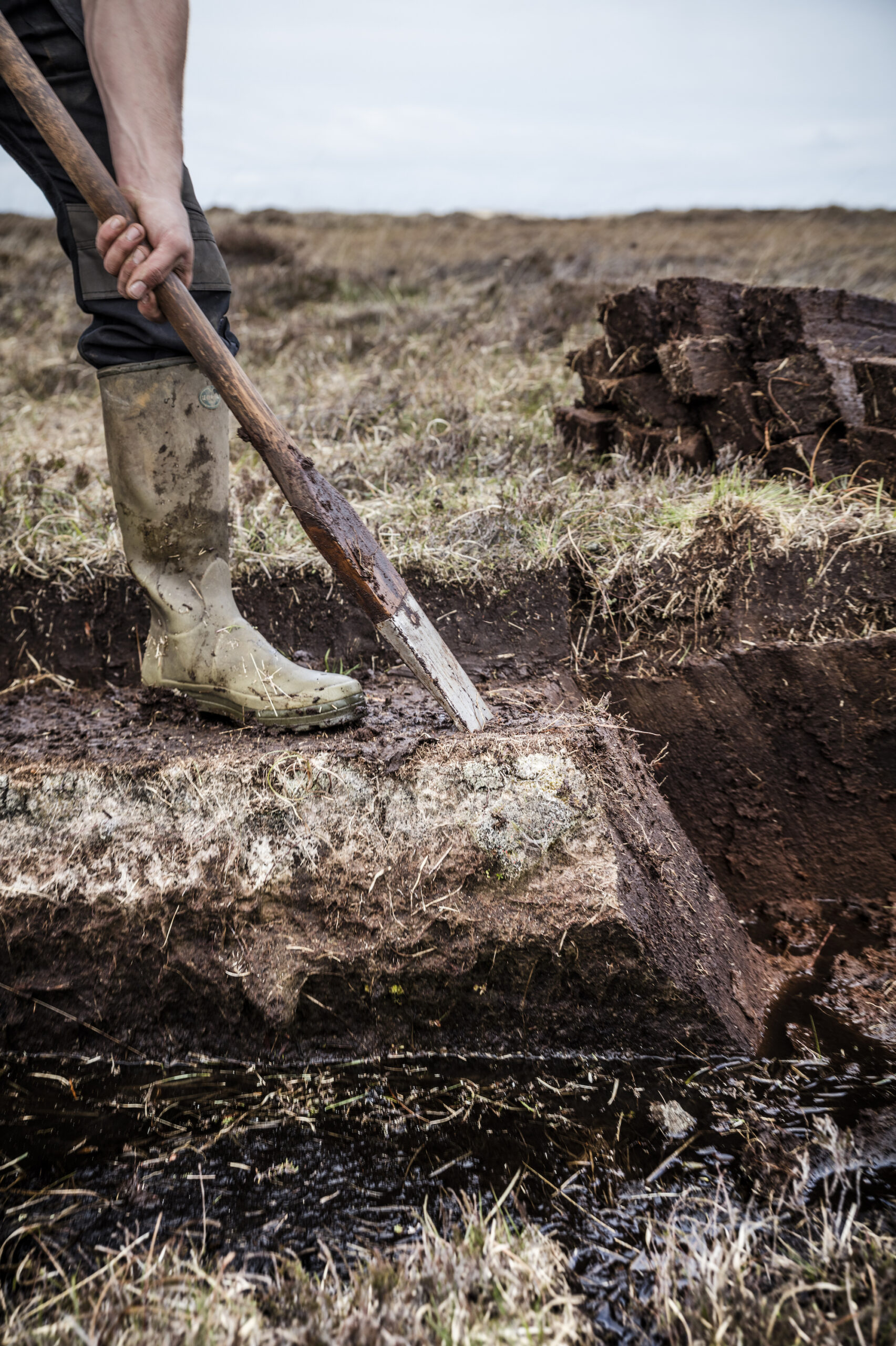 Traditional Peat Cutting Kilchoman Distillery
