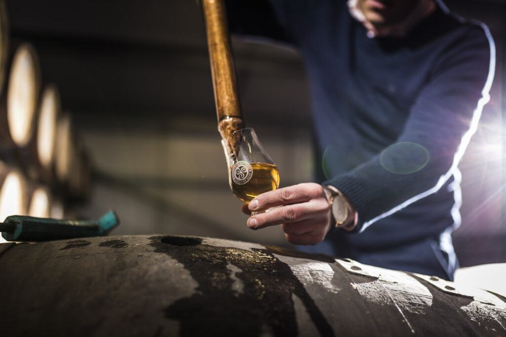 Cask sample in the warehouse at Kilchman distillery