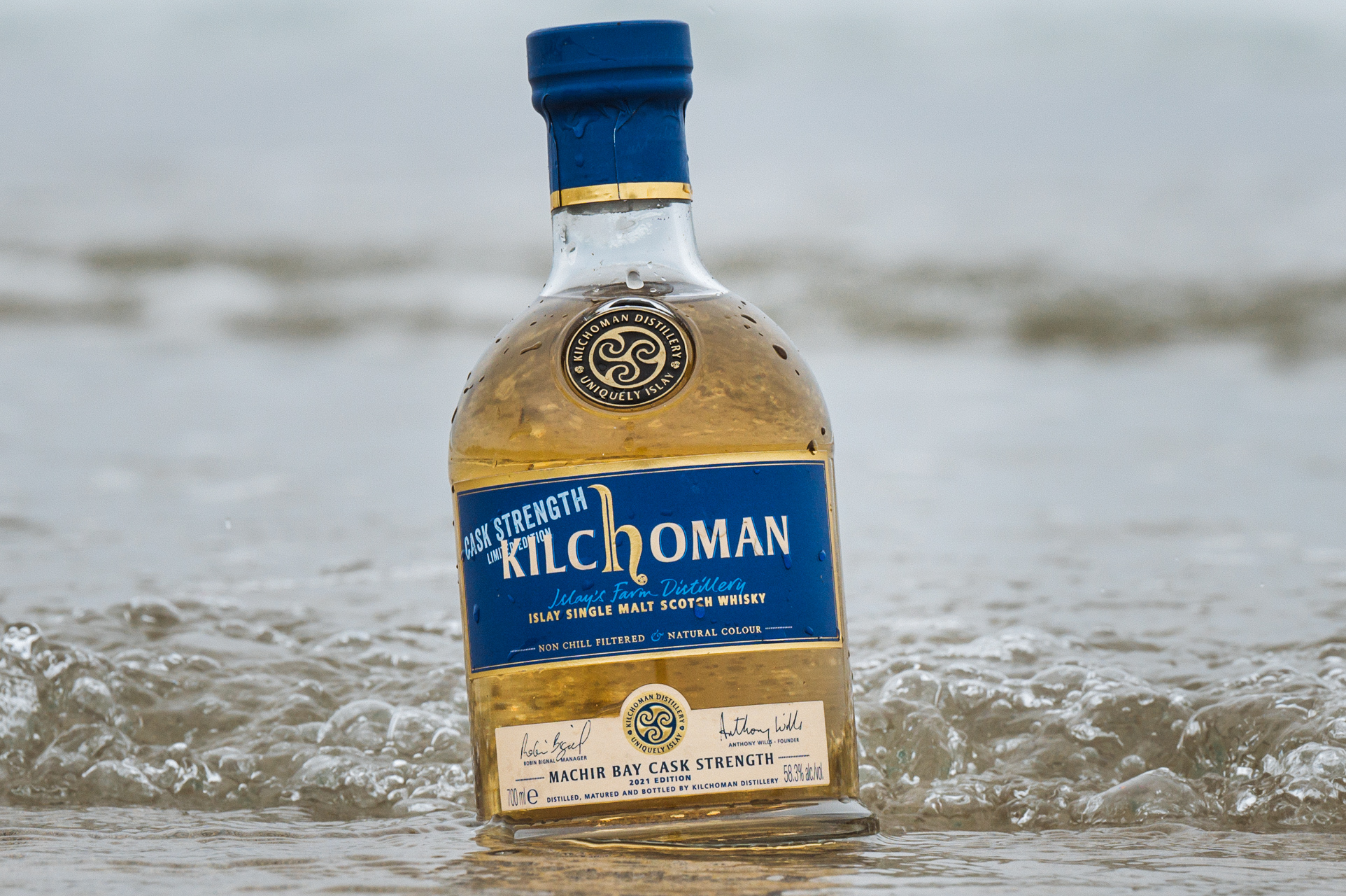 Machir Bay Cask Strength bottle on the beach