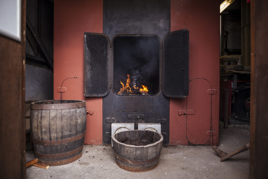 The kiln at Kilchoman Distillery. Traditional floor malting peated islay whisky with hand cut Islay peat